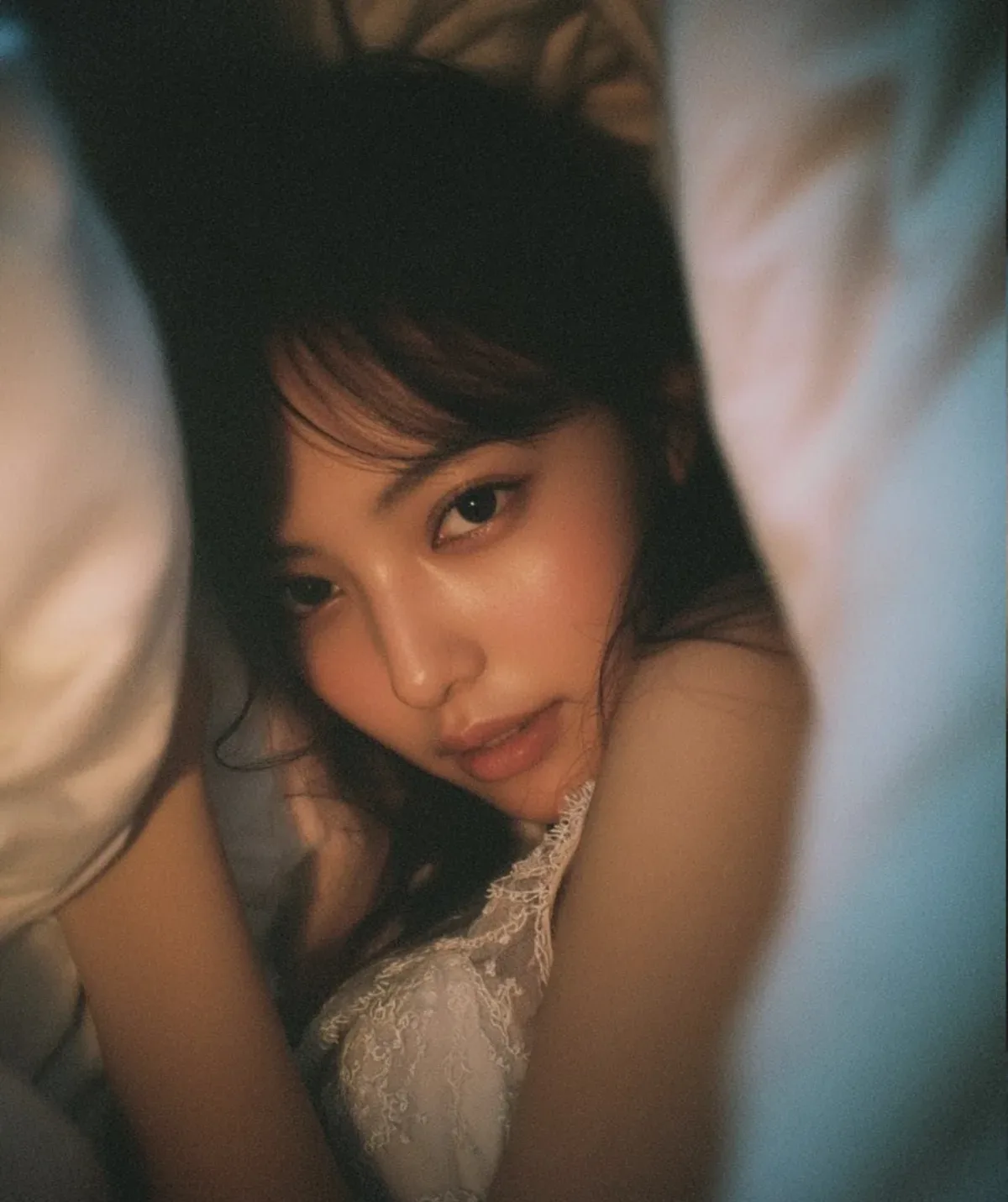 A Dreamy Intimate Portrait Of A Captivating True-to-life Asian Woman