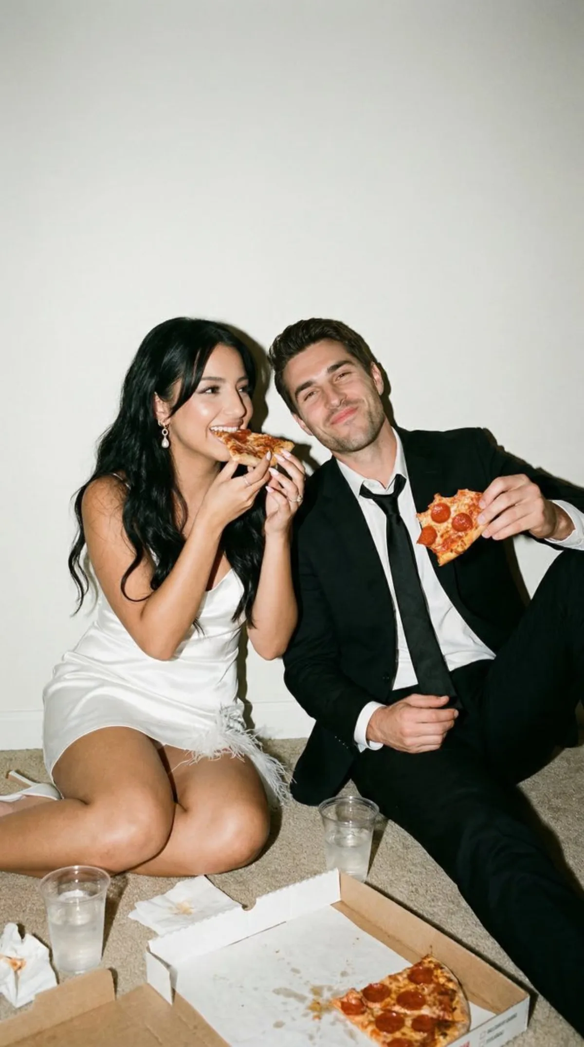 Flash Editorial After-Party Portrait of Couple Eating Pizza (Refined)