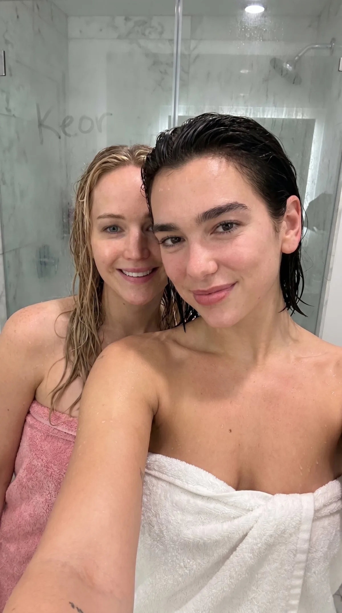 Editorial Dua Lipa Jennifer Lawrence Wet Bathroom Selfie