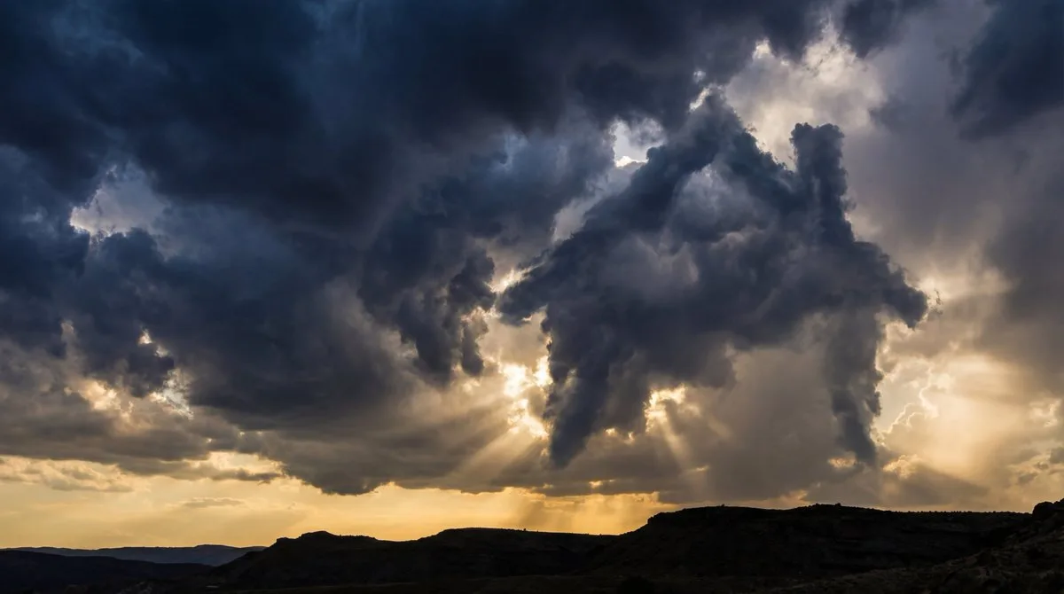 Mysterious Silhouette in Storm Clouds